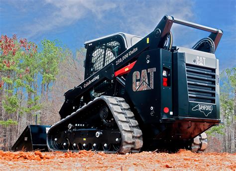 caterpillar skid steer with attachments on a trailer|caterpillar skid steer aerator attachment.